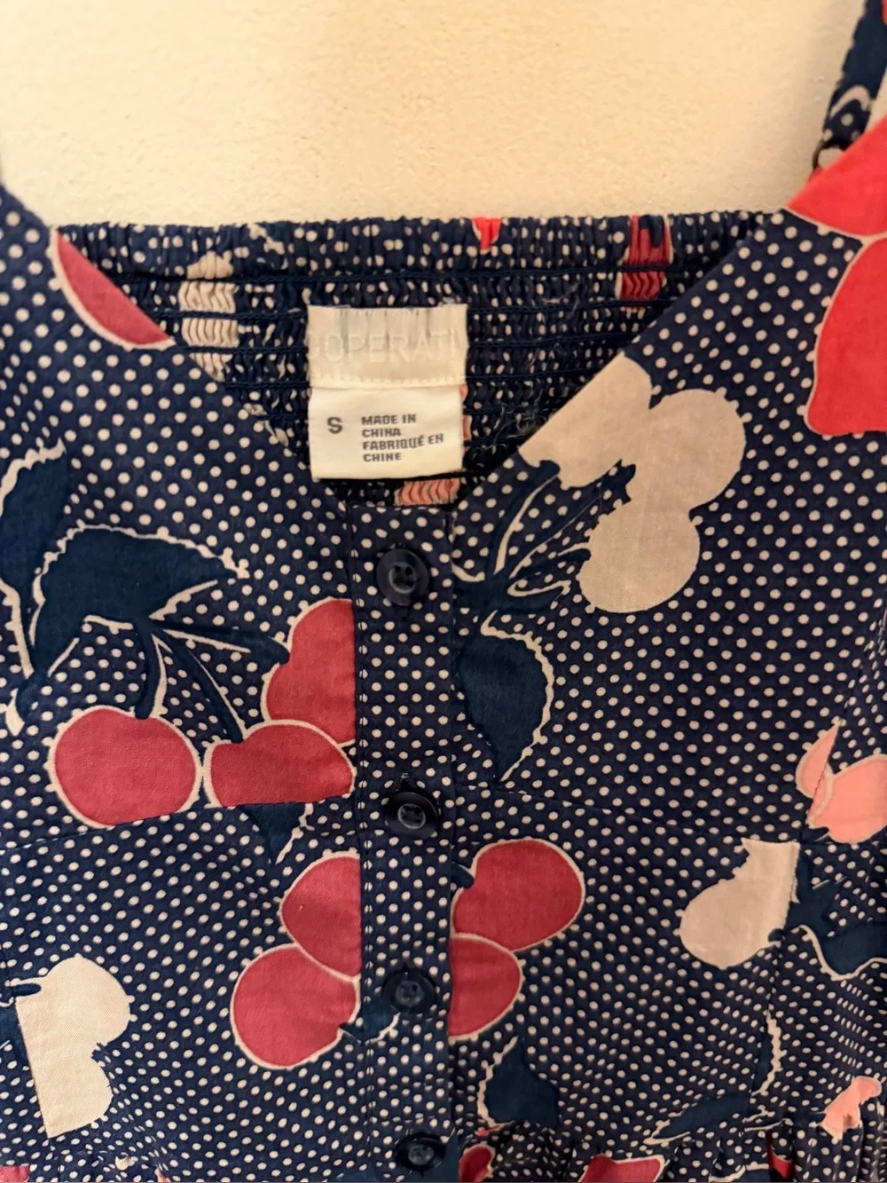 UO’s VTG Cooperative Cherry Blossom Smocked Mini Dress